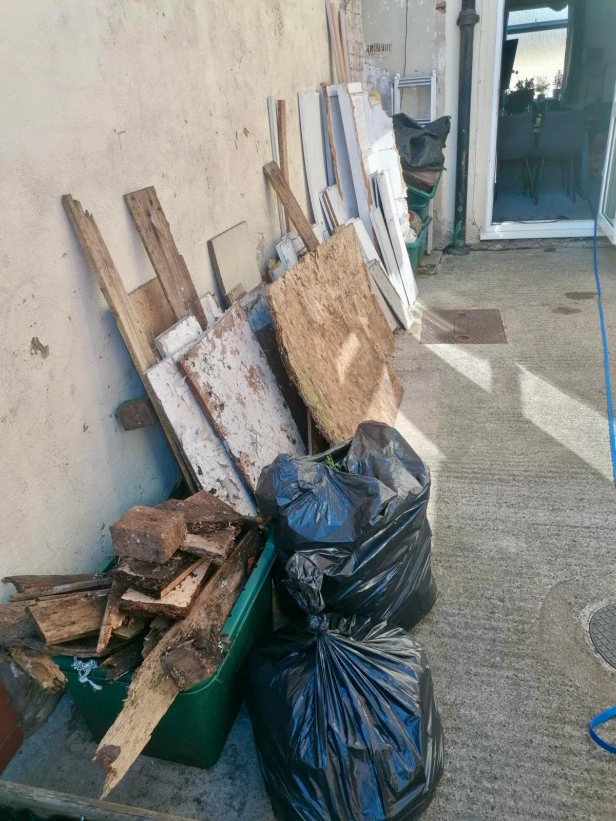 Licensed waste carrier collecting rubbish in Gloucestershire